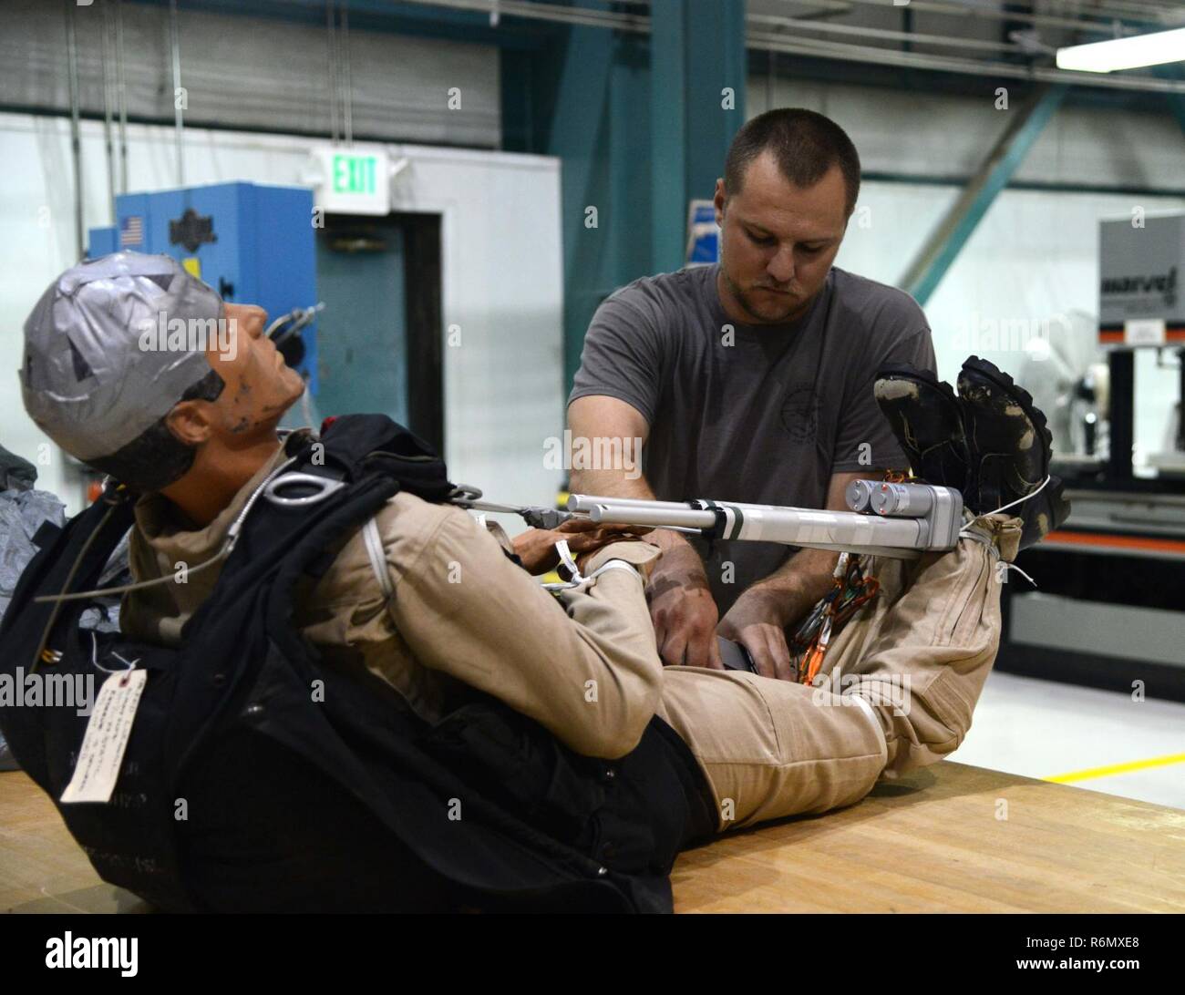 Trever Bush, 412th OSS Parachute Test Team, demonstrates the operation of the Remotely Piloted