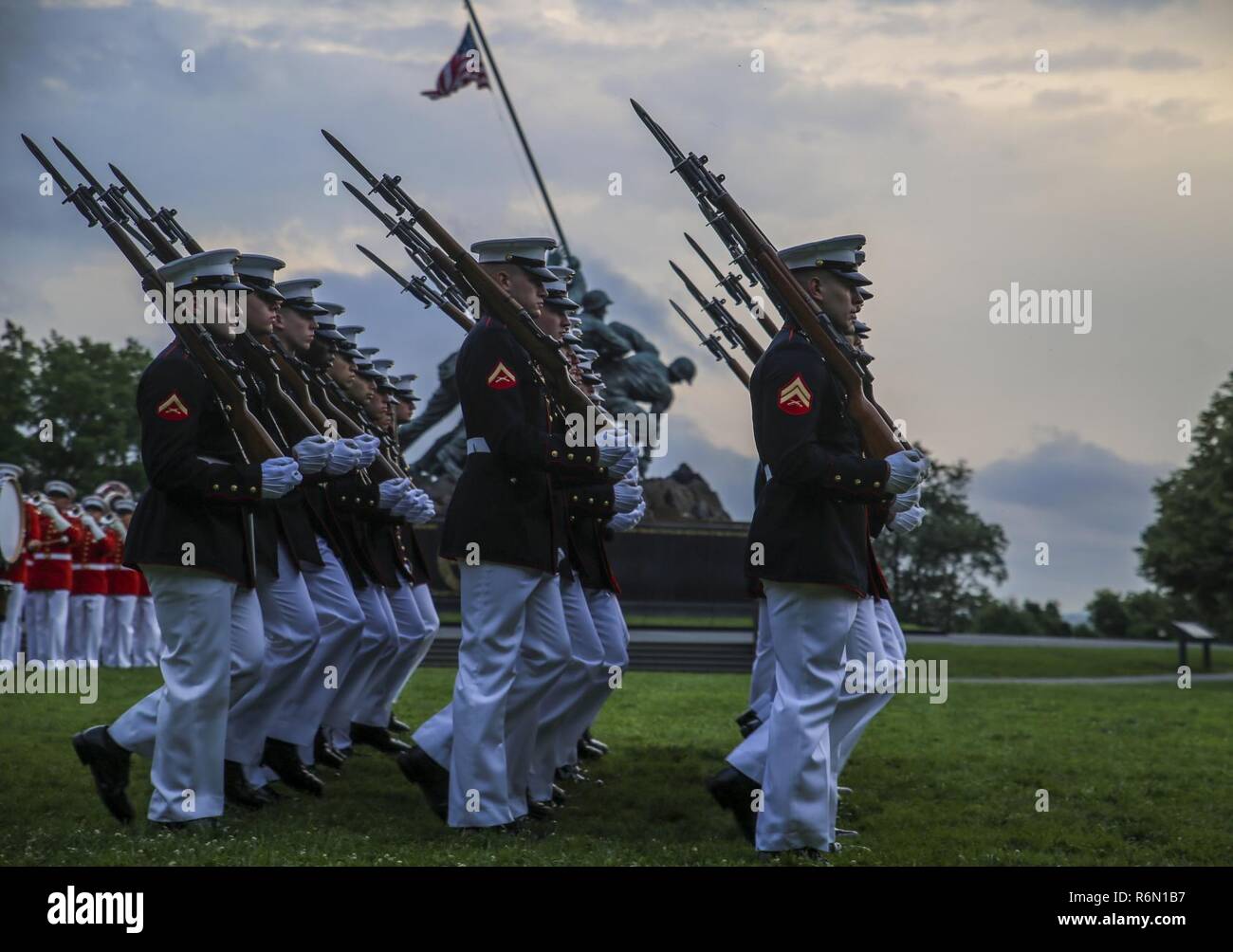 Marching companies with Marine Barracks Washington D.C., execute pass ...