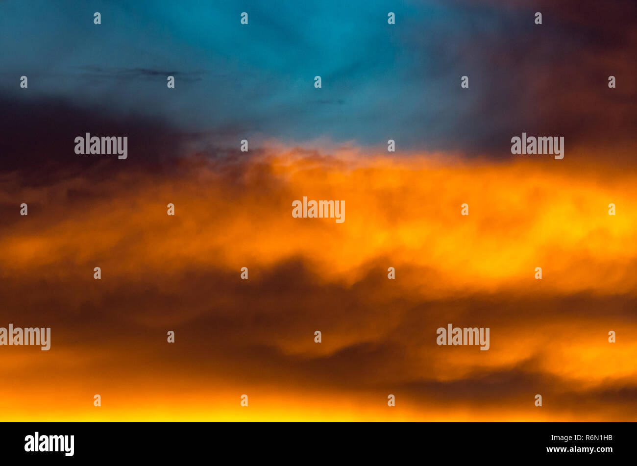 Background texture of dramatic sunset sky with orange clouds after ...