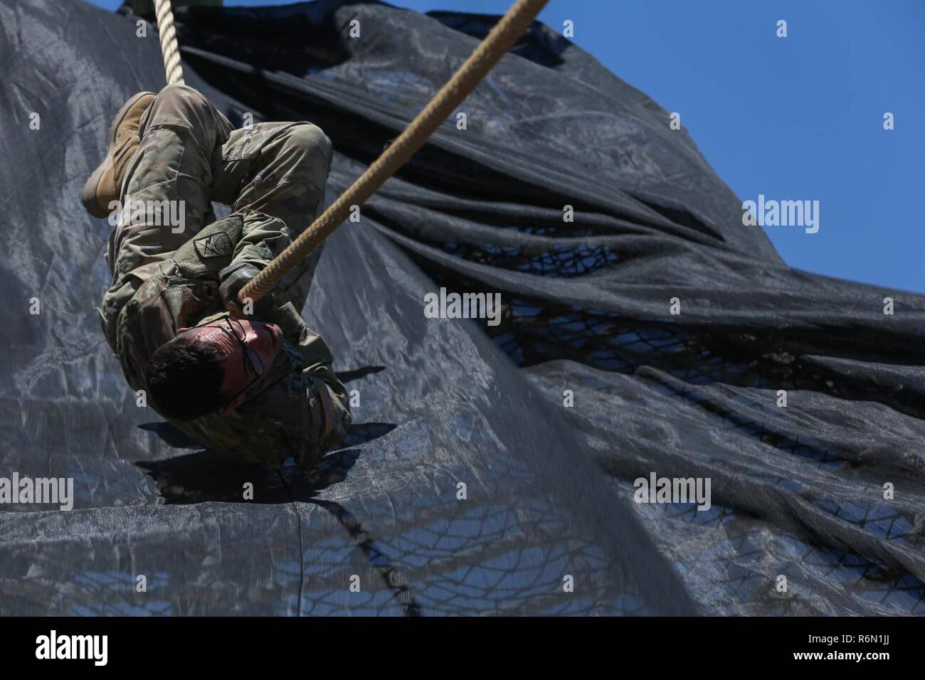 U.S. Army Spc. Stephen Calderone, assigned to the 160th Signal Brigade ...
