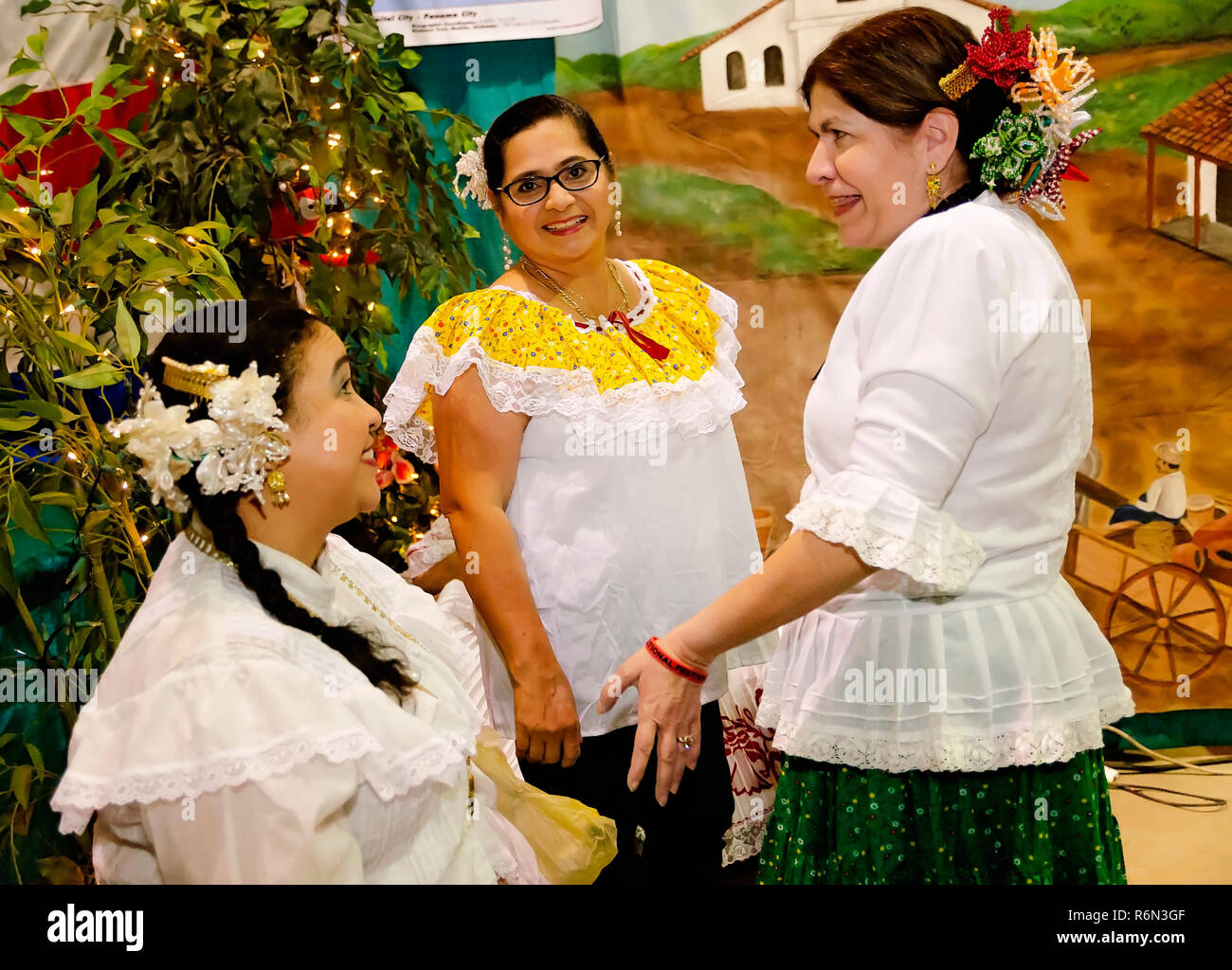 Panamanian women talk at the 34th annual Mobile International Festival, Nov. 17, 2018, in Mobile, Alabama. Stock Photo