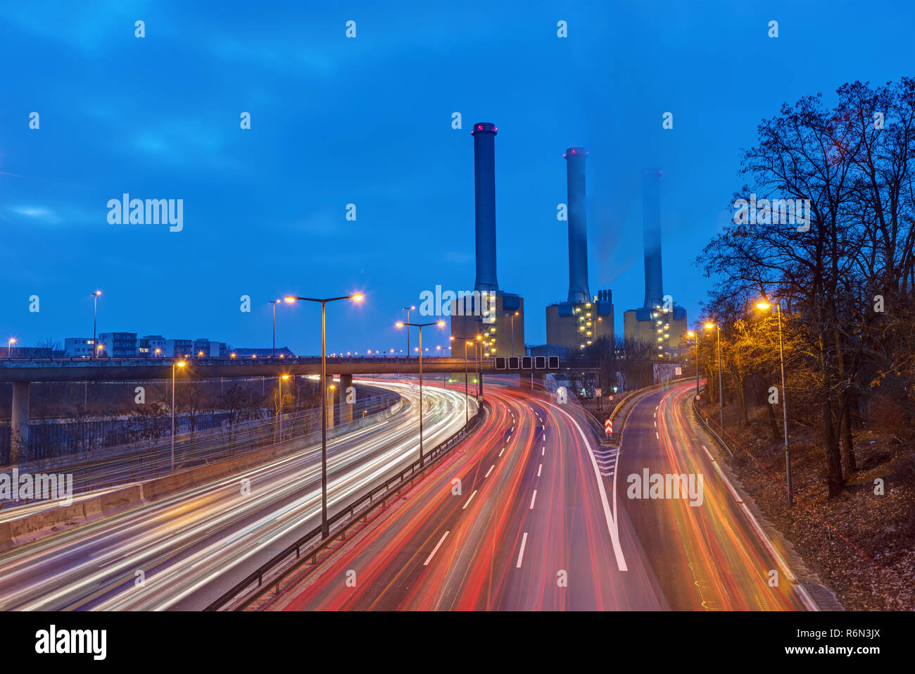 power station and freeway at dusk seen in berlin,germany Stock Photo