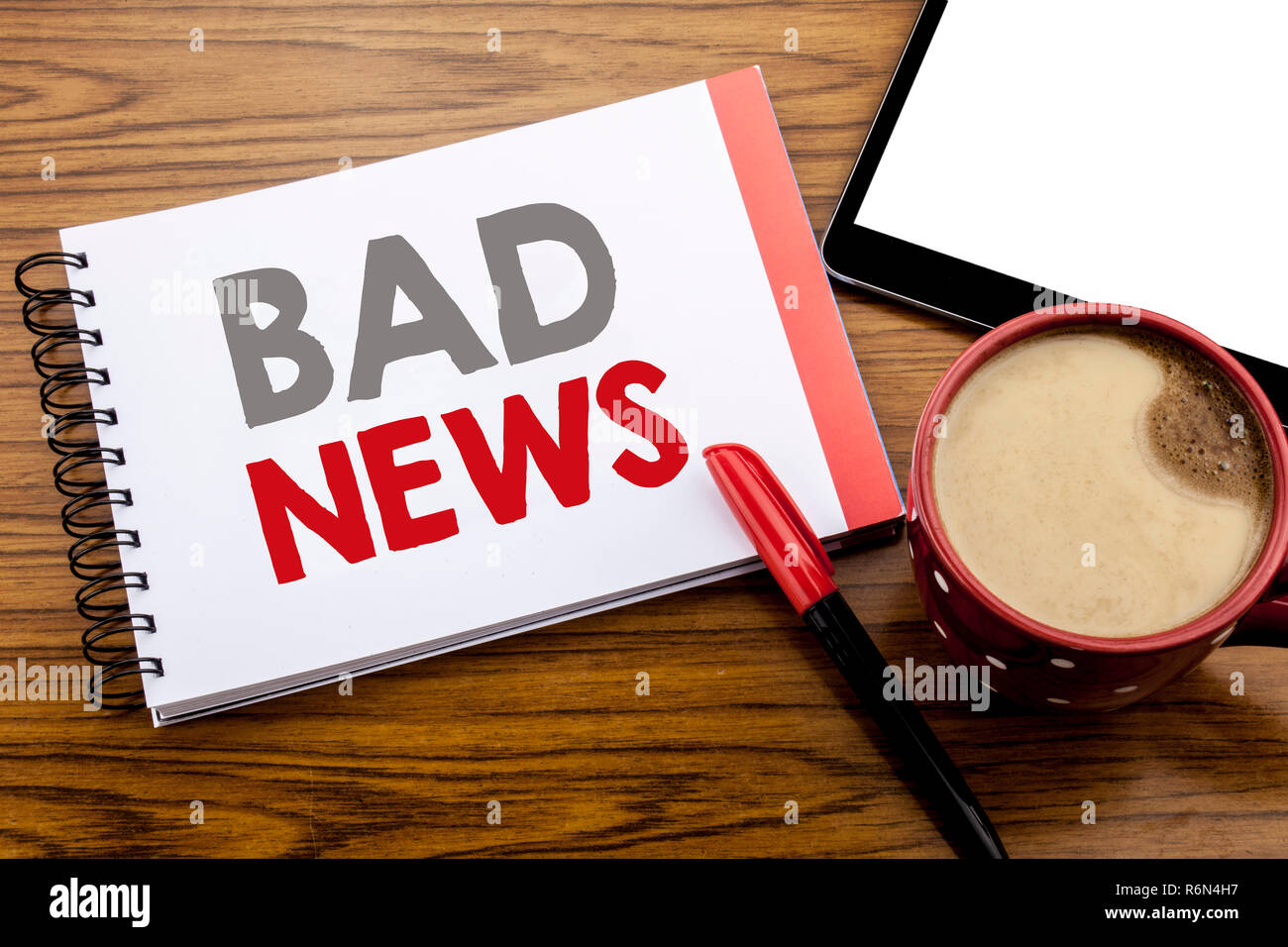 Handwriting Announcement text showing Bad News. Business concept for Failure Media Newspaper Written on notepad note paper on wooden background with space office view with pencil marker Stock Photo
