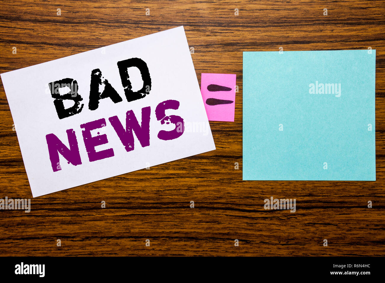 Handwriting Announcement text showing Bad News. Business concept for Failure Media Newspaper written on sticky note paper on wooden background. Equation mathematical sign for your space Stock Photo