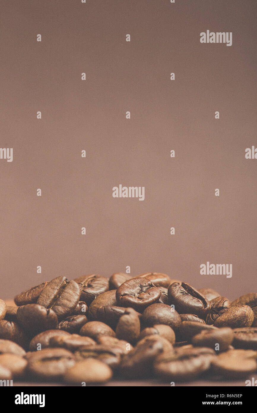 Brown roasted coffee beans on dark background. Espresso dark, aroma ...