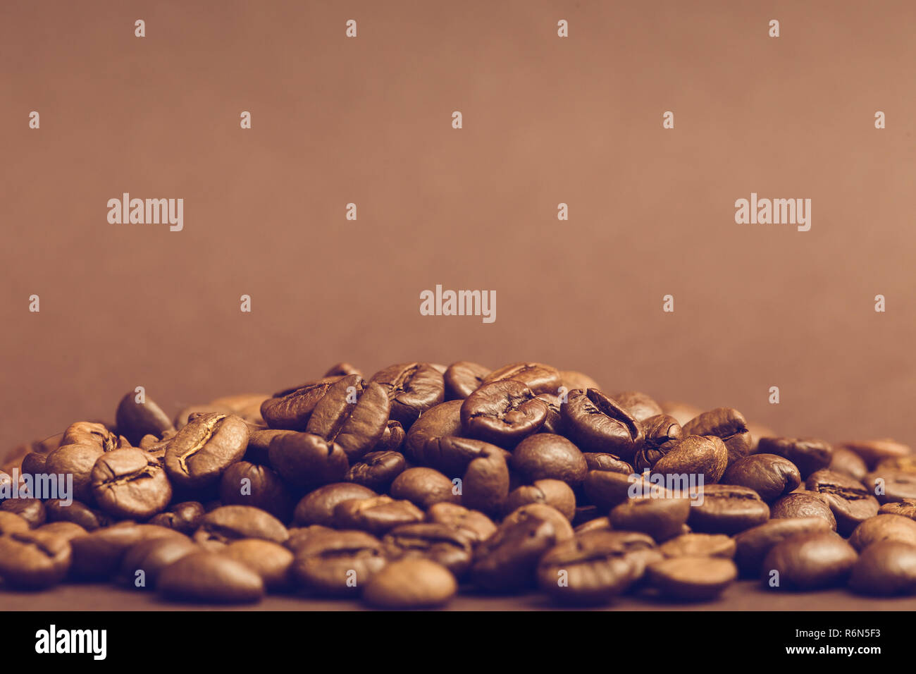 Brown roasted coffee beans on dark background. Espresso dark, aroma ...