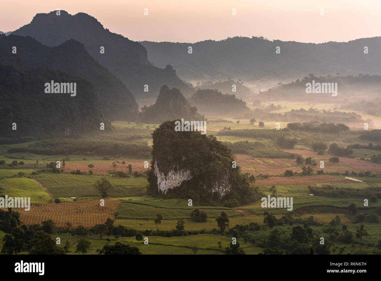 View of covered in foggy during morning sunrise Stock Photo - Alamy