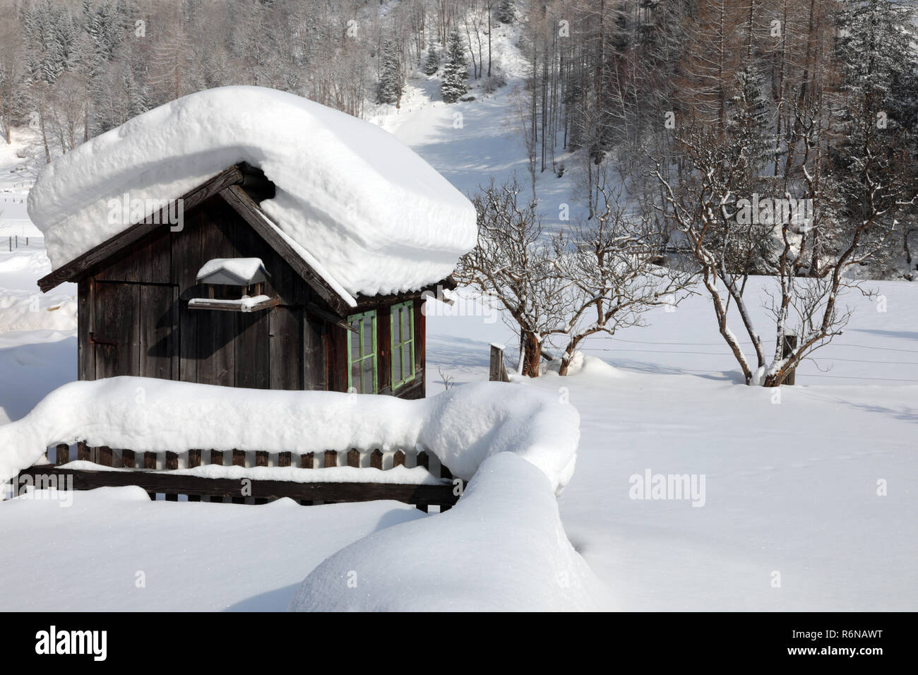 much snow on hut in winkl near heiligenblut below the groÃŸglockner massif Stock Photo