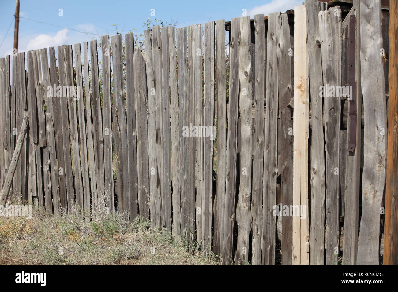 Unpainted picket fence hi-res stock photography and images - Alamy
