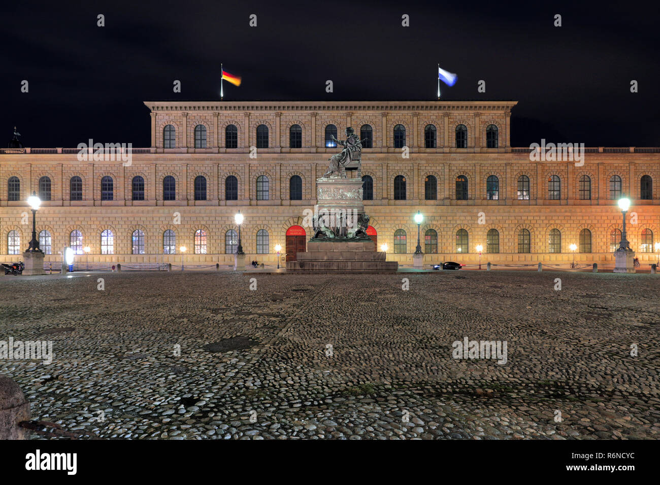 the residence at max joseph platz with a monument of king maximilian at night in munich Stock Photo