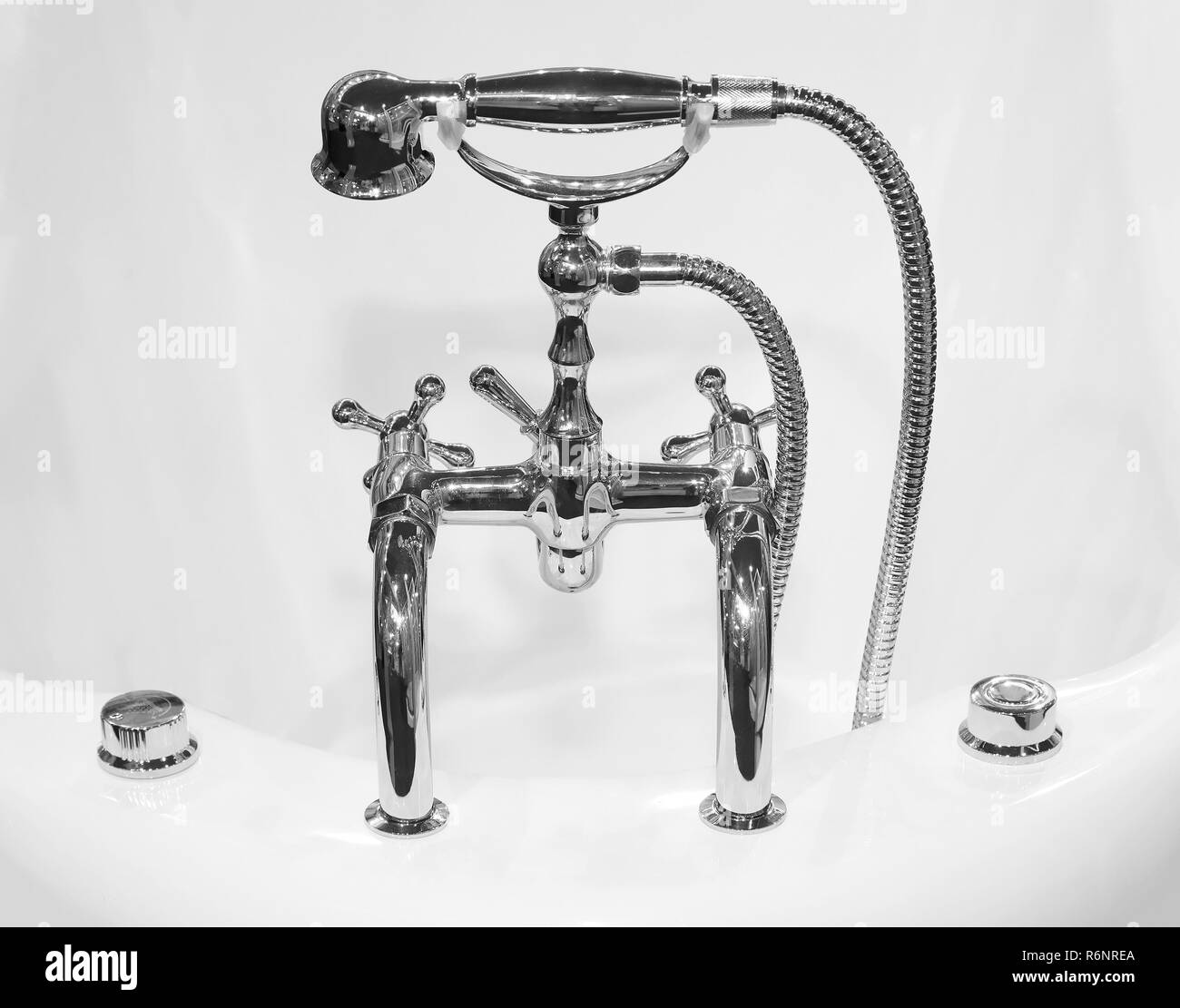 Vintage bathtub faucet fixture Stock Photo