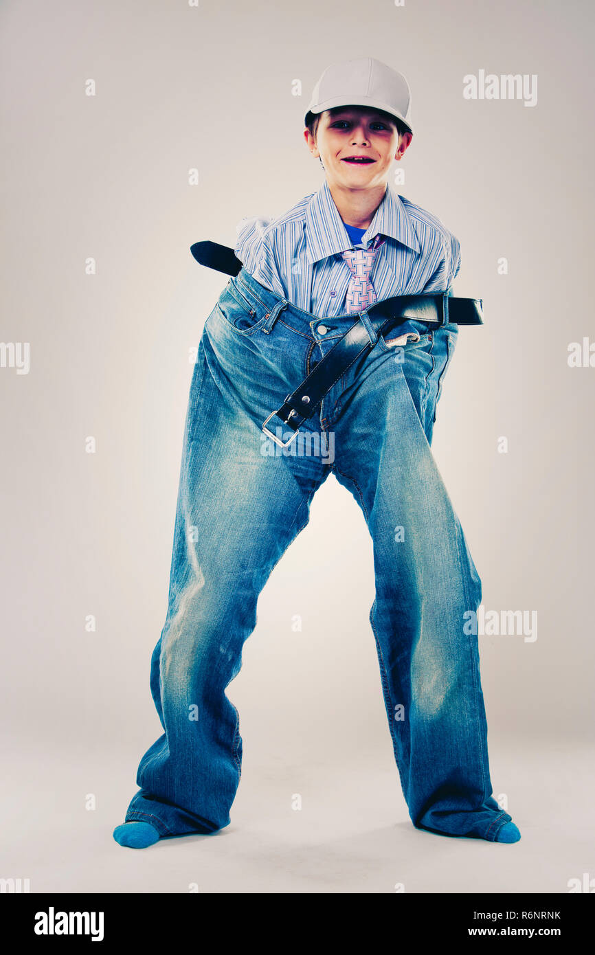 Wearing clothes too big hi-res stock photography and images - Alamy