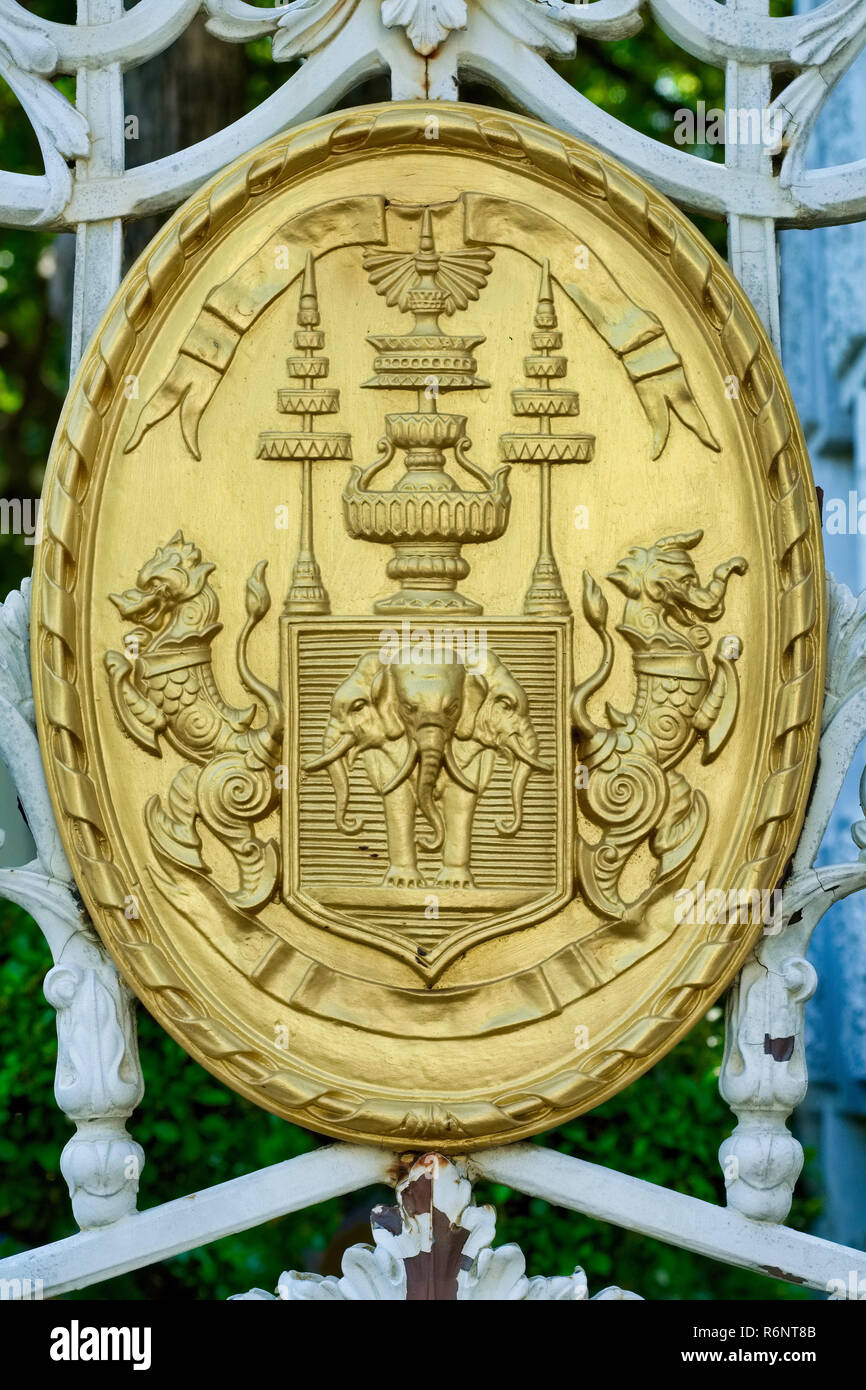The Bangkok municipal coat of arms, attached to the fence around Saranrom Park, Bangkok, Thailand Stock Photo