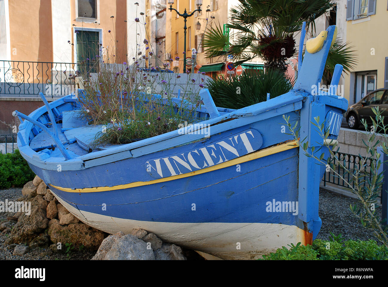 Wooden boat in front of the Cathedral of Our Lady of the Assumption of