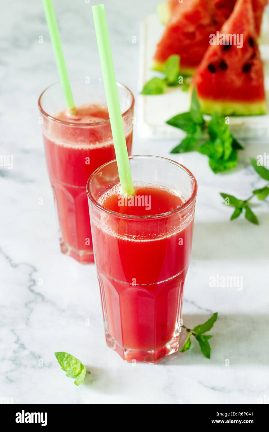 Cold Watermelon Lemonade With Mint In A Glass Cup And Slices Of Watermelon On A Light Background Stock Photo Alamy Cold Watermelon Lemonade With Mint In A Glass Cup And Slices Of Watermelon On A Light Background Stock Photo Alamy
