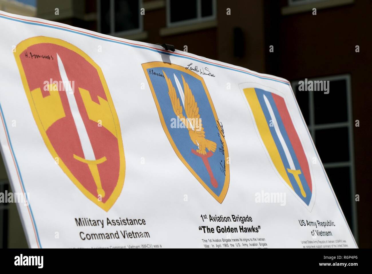Memorial placards bearing the names and insignia of various military units  that served in the Vietnam Conflict are displayed during a Memorial Day  ceremony at the 29th Infantry Brigade Combat Team headquarters
