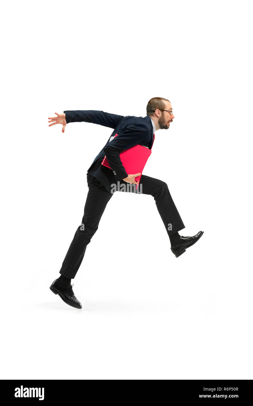 Businessman running with a folder on white background Stock Photo