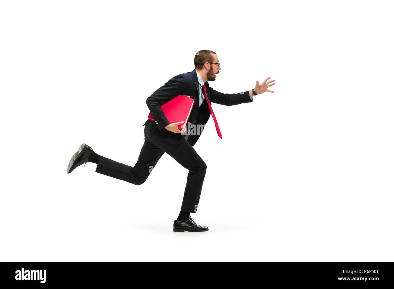 Businessman running with a folder on white background Stock Photo