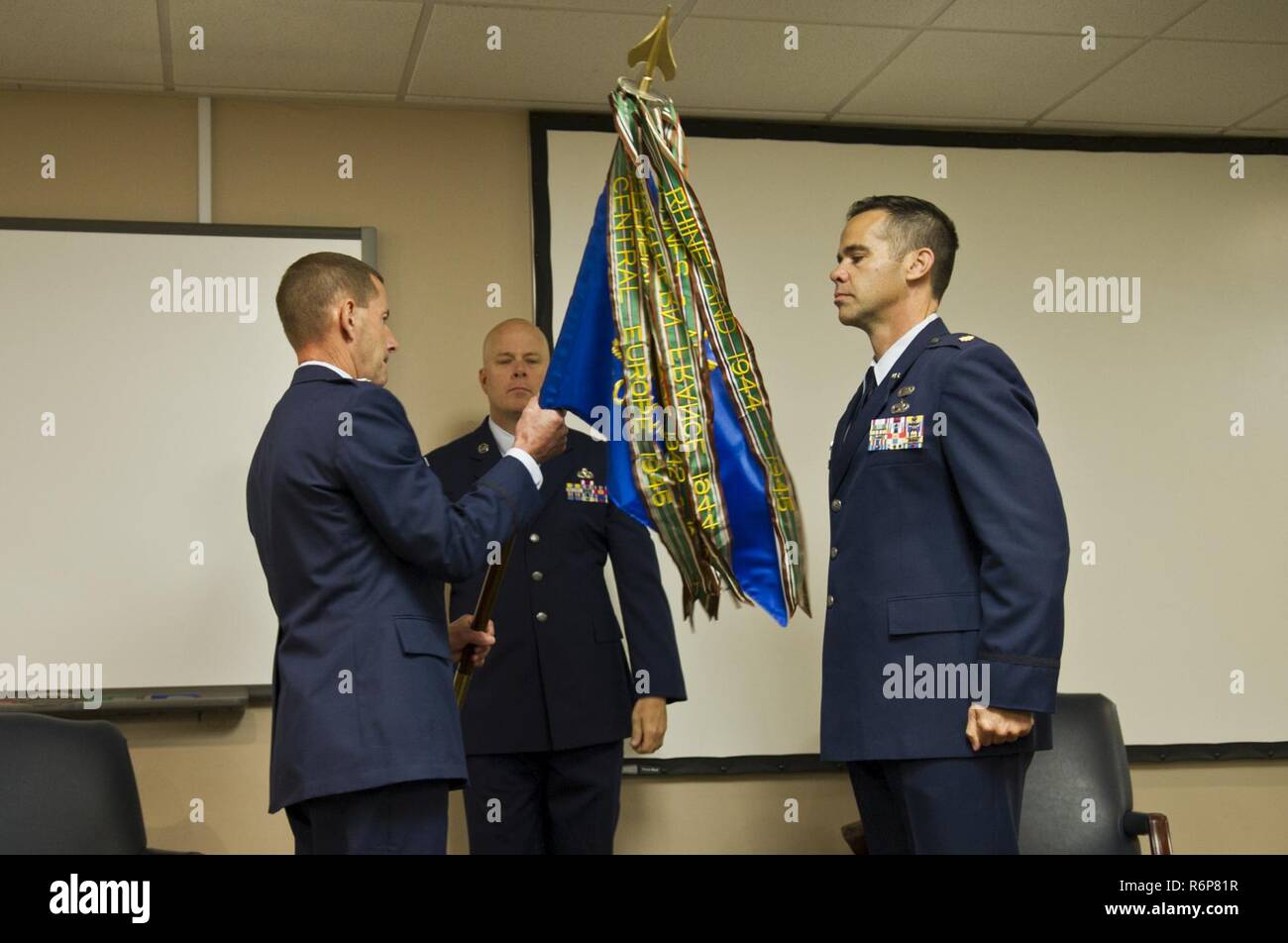 Usaf Col Hamilton U.S. Air Force Lt. Col. John Robinson presents the guidon to Maj ...
