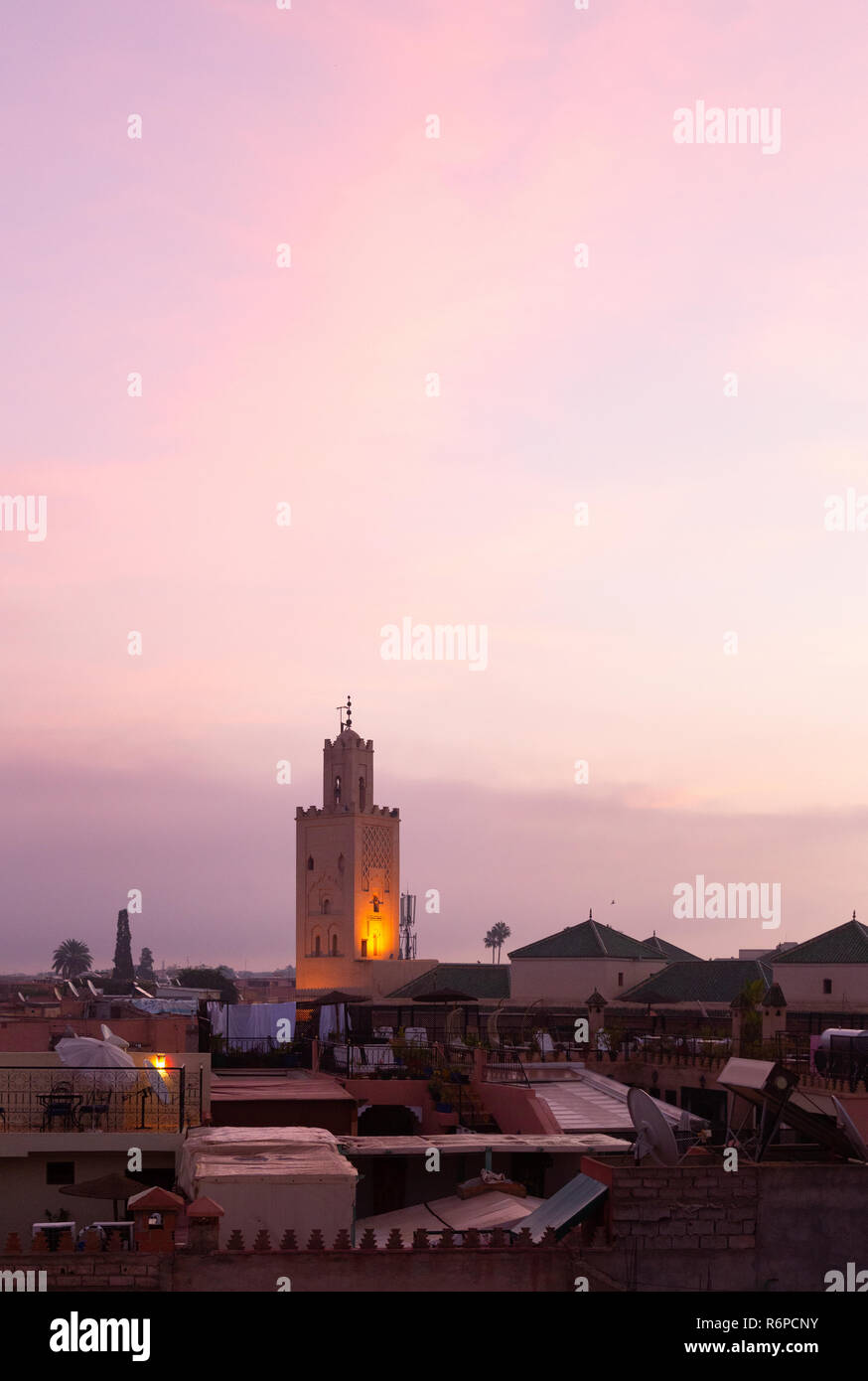 Marrakech sunrise over rooftops and a mosque, Marrakesh, Morocco North Africa Stock Photo