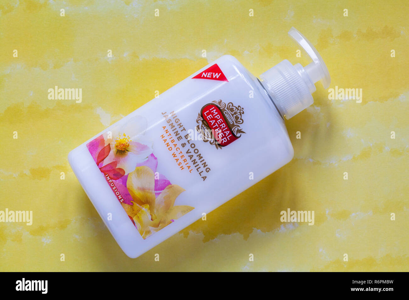 dispenser bottle of Imperial Leather night blooming jasmine & vanilla antibacterial hand wash handwash on colourful background Stock Photo