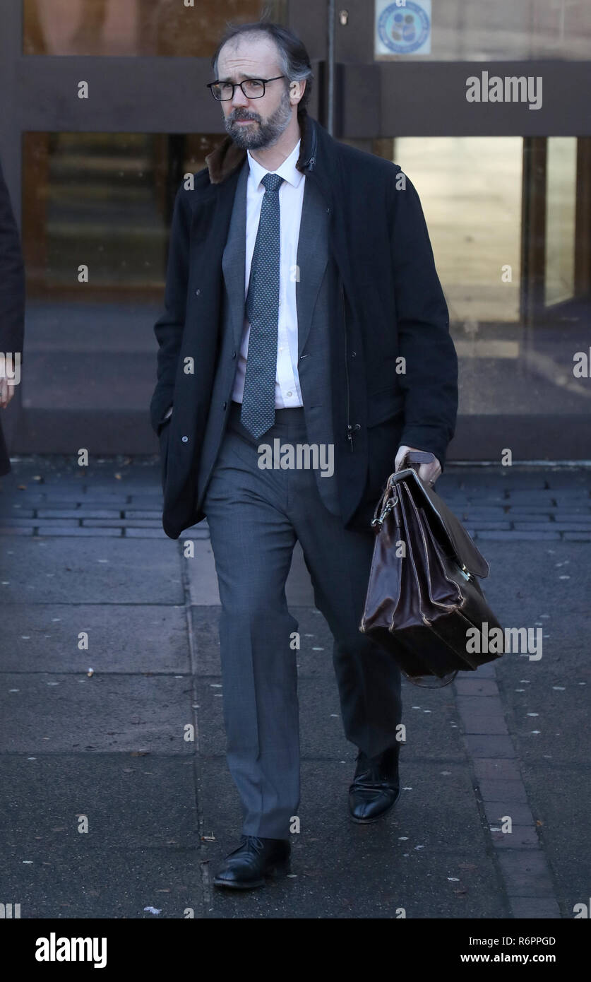 Neil Murray, the husband of author JK Rowling, leaves Airdrie Sheriff Court where his wife is taking legal action against her former PA, Amanda Donaldson, for allegedly using her money to go on shopping sprees. Stock Photo