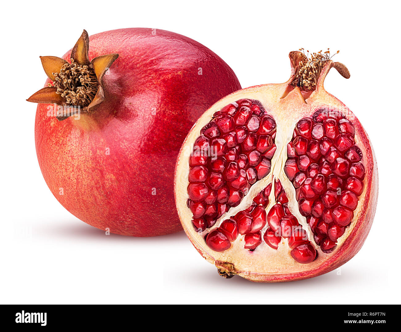 Ripe pomegranate fruit and one cut in half isolated on white background.  Clipping Path. Full depth of field Stock Photo - Alamy