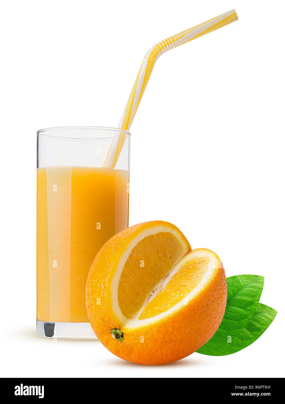 Glass of fresh orange juice with a yellow striped straw and oranges
