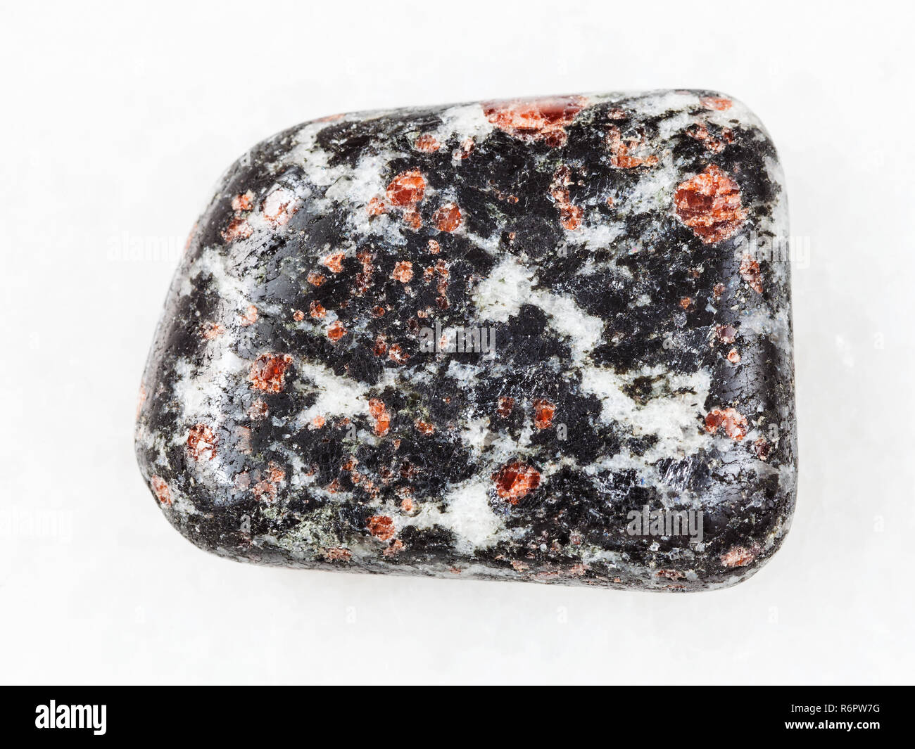 Garnet crystals in polished Hornblende stone Stock Photo