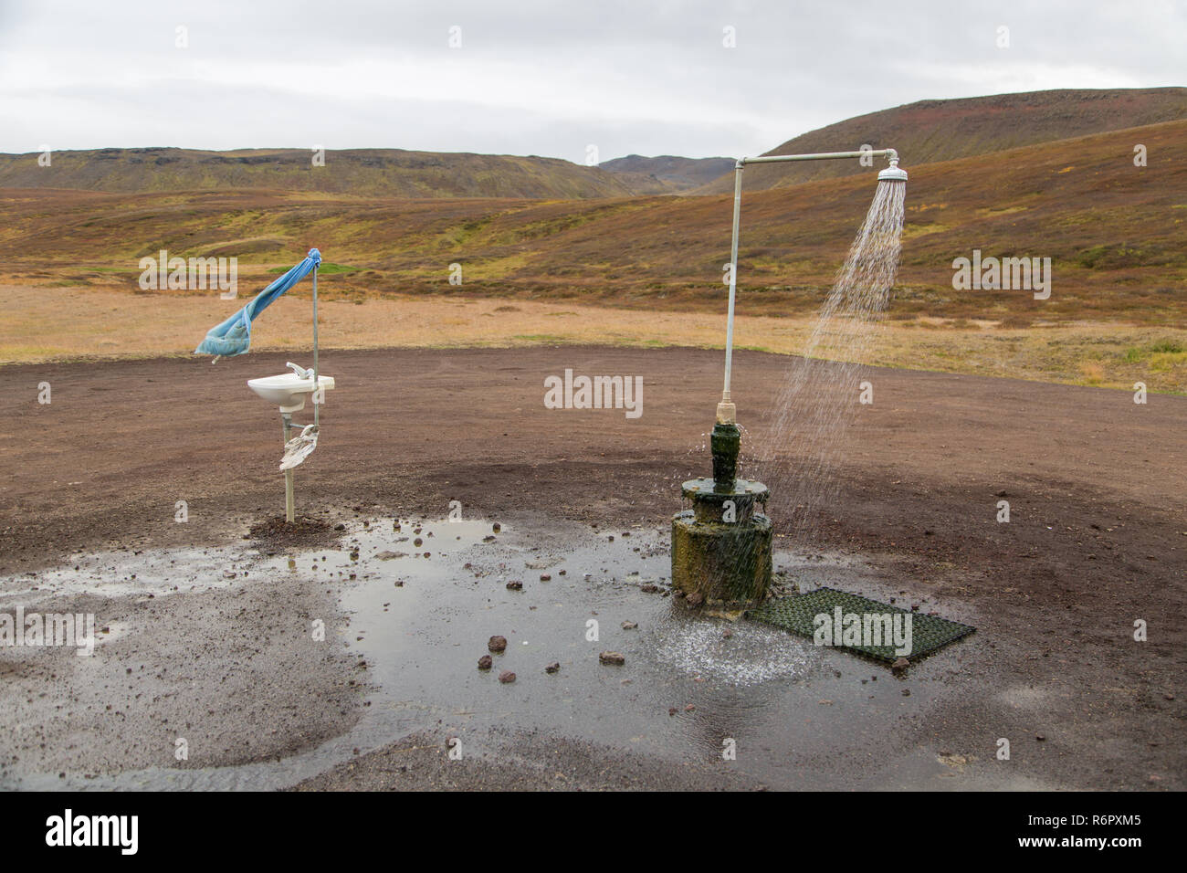 Outdoor toilet and hot spring shower from geothermal power at the Krafla volcano near Lake Myvatn, Iceland Stock Photo