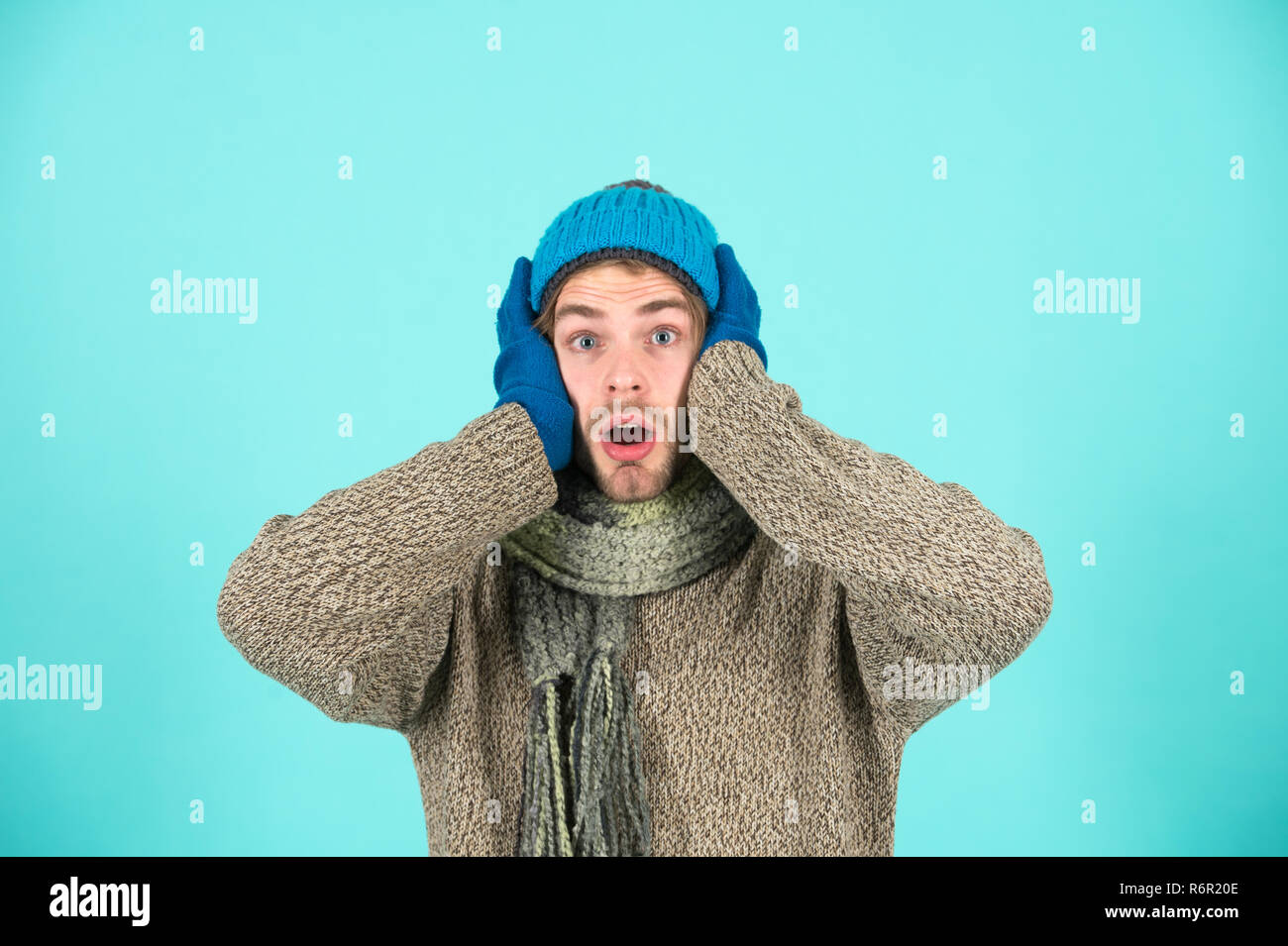 Its real scary. Man with scary face in cold sweat. Man wear winter