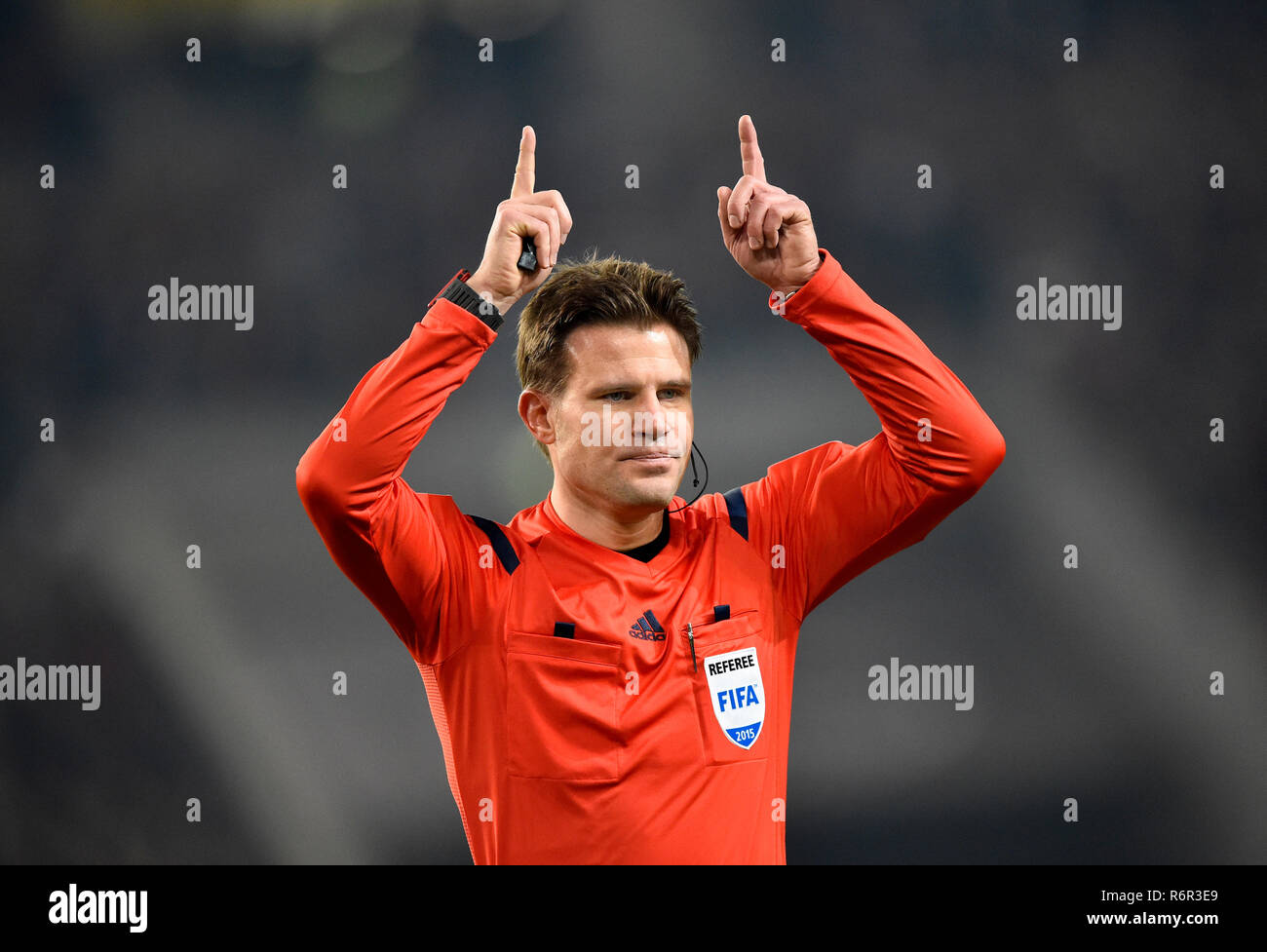 Referee Dr. Felix Brych gestures for throw, Mercedes-Benz Arena, Stuttgart, Baden-Wurttemberg, Germany Stock Photo