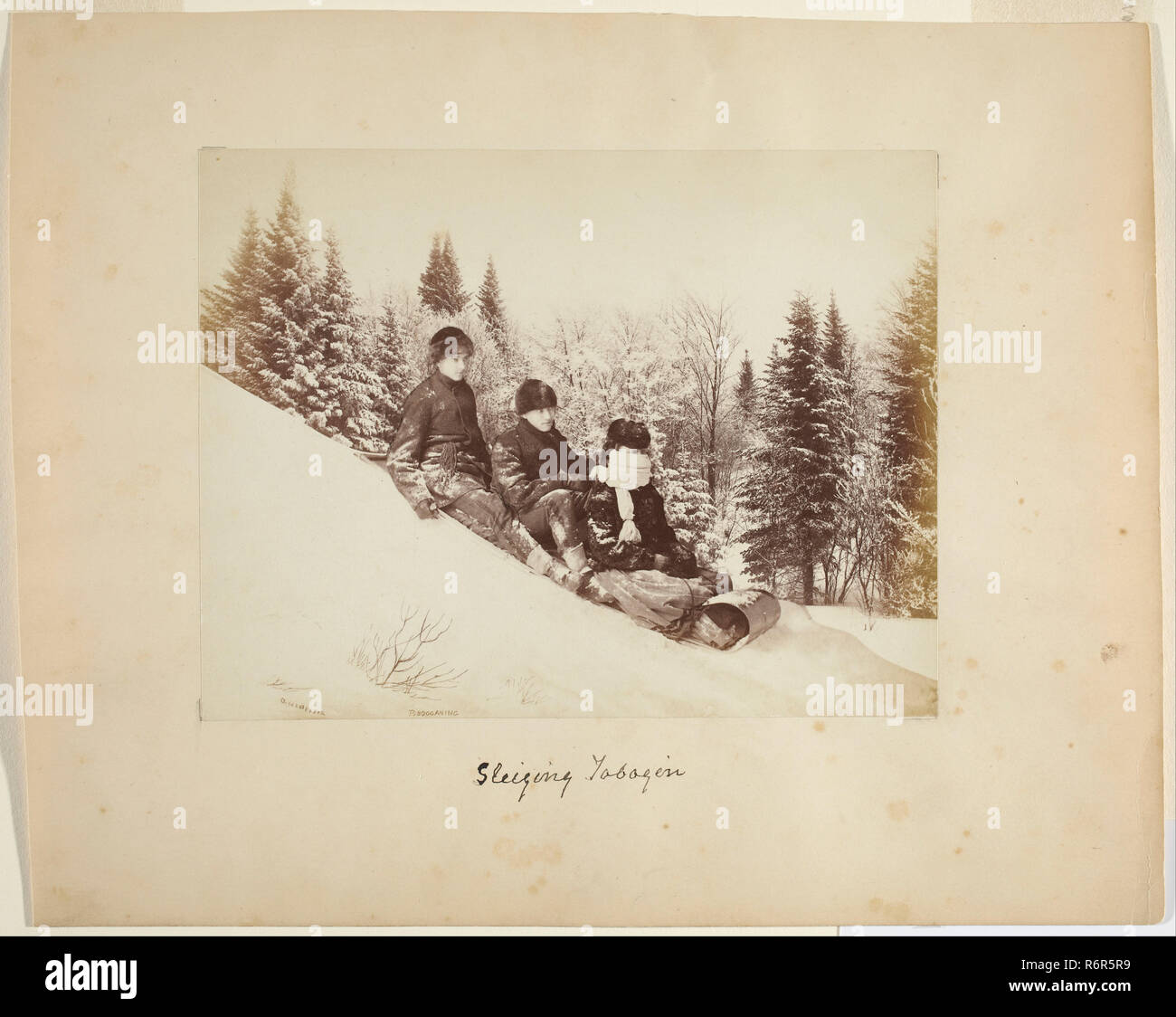 Tobogganing. Date/Period: Ca. 1873. Photograph. Albumen print (composite) albumen print (composite). Height: 152 mm (5.98 in); Width: 197 mm (7.75 in). Author: ALEXANDER HENDERSON. Stock Photo