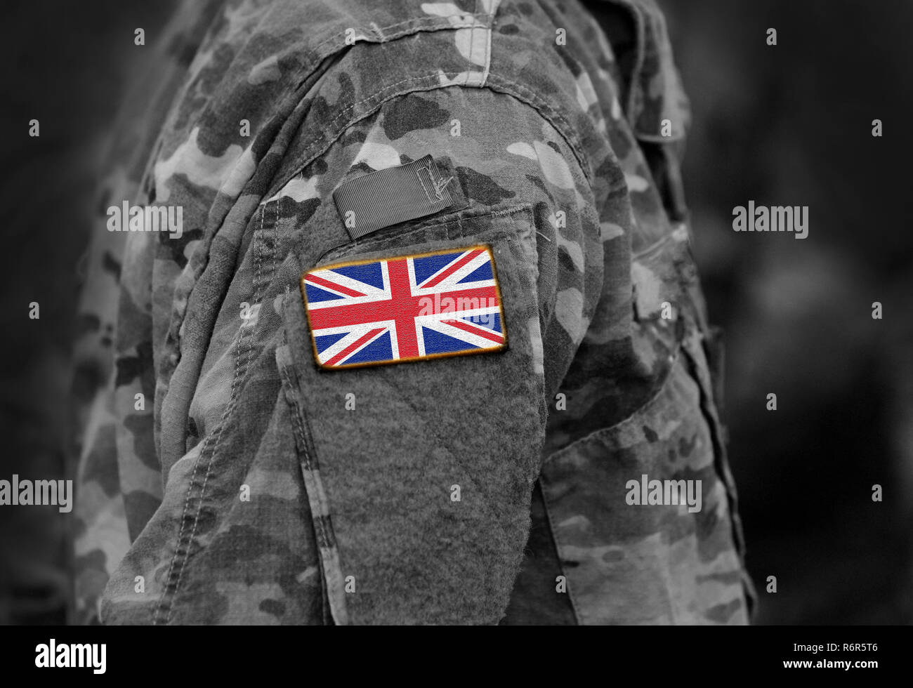 Flag of United Kingdom on soldiers arm. Flag of UK on military uniforms (collage). Stock Photo