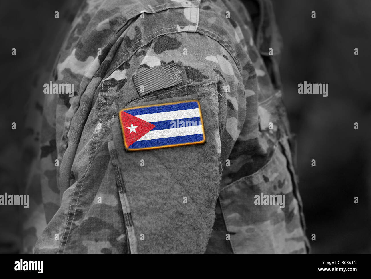 Flag of Cuba on soldiers arm. Flag of Cuba on military uniforms (collage). Stock Photo