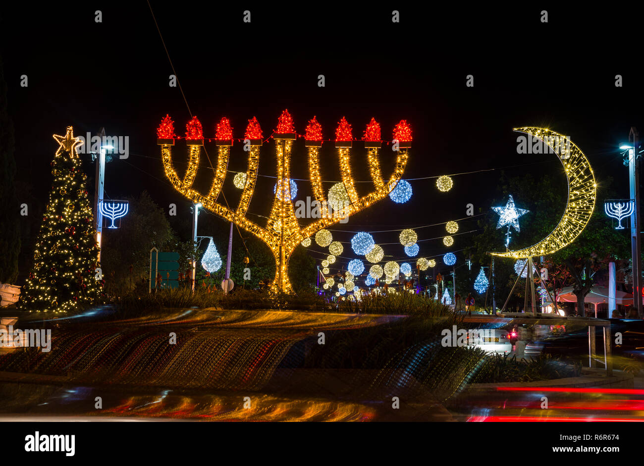 Haifa, Israel - December 1, 2018 : Three religions light ornaments in ...