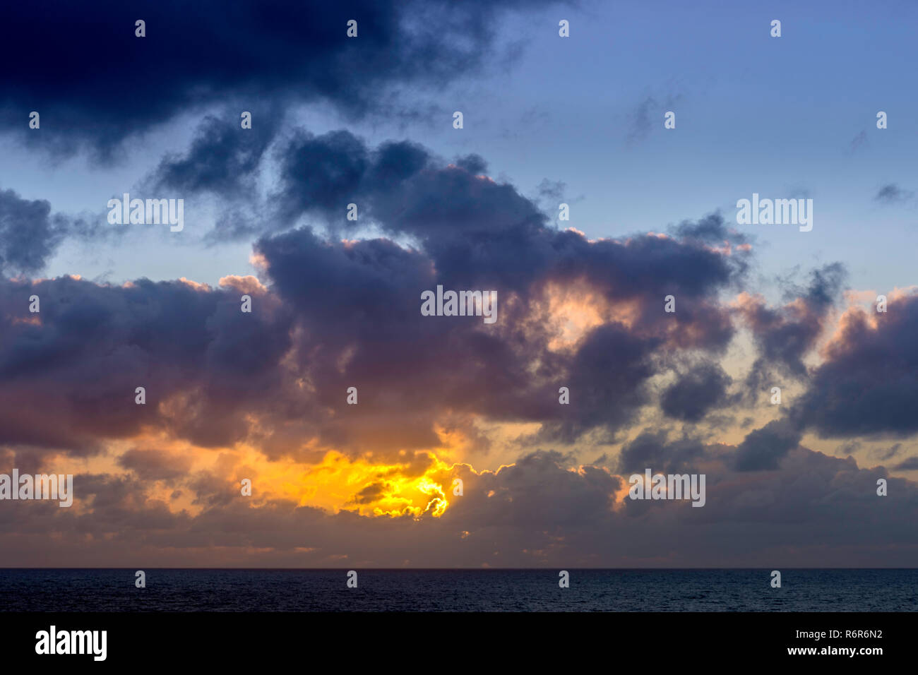 Dramatic sunrise over the ocean before storm Stock Photo - Alamy