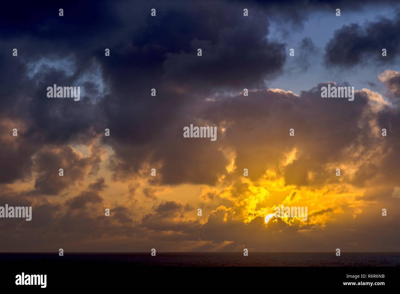 Dramatic sunrise over the ocean before storm Stock Photo - Alamy