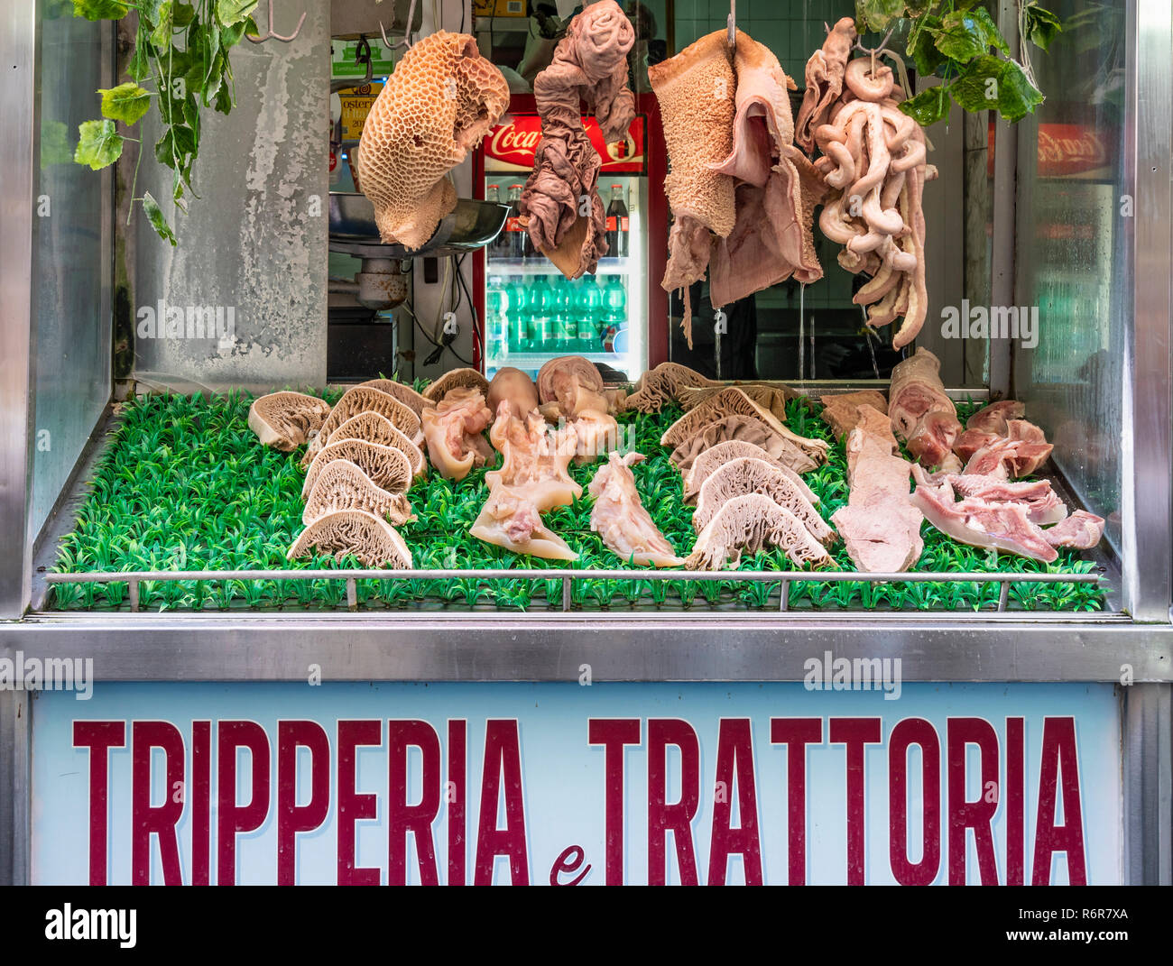 A window display at a Tripperia and Tratoria, Tripe shop and restaurant,  specialising in all kinds of tripe and offal, in the Via Pignasecca on the n Stock Photo