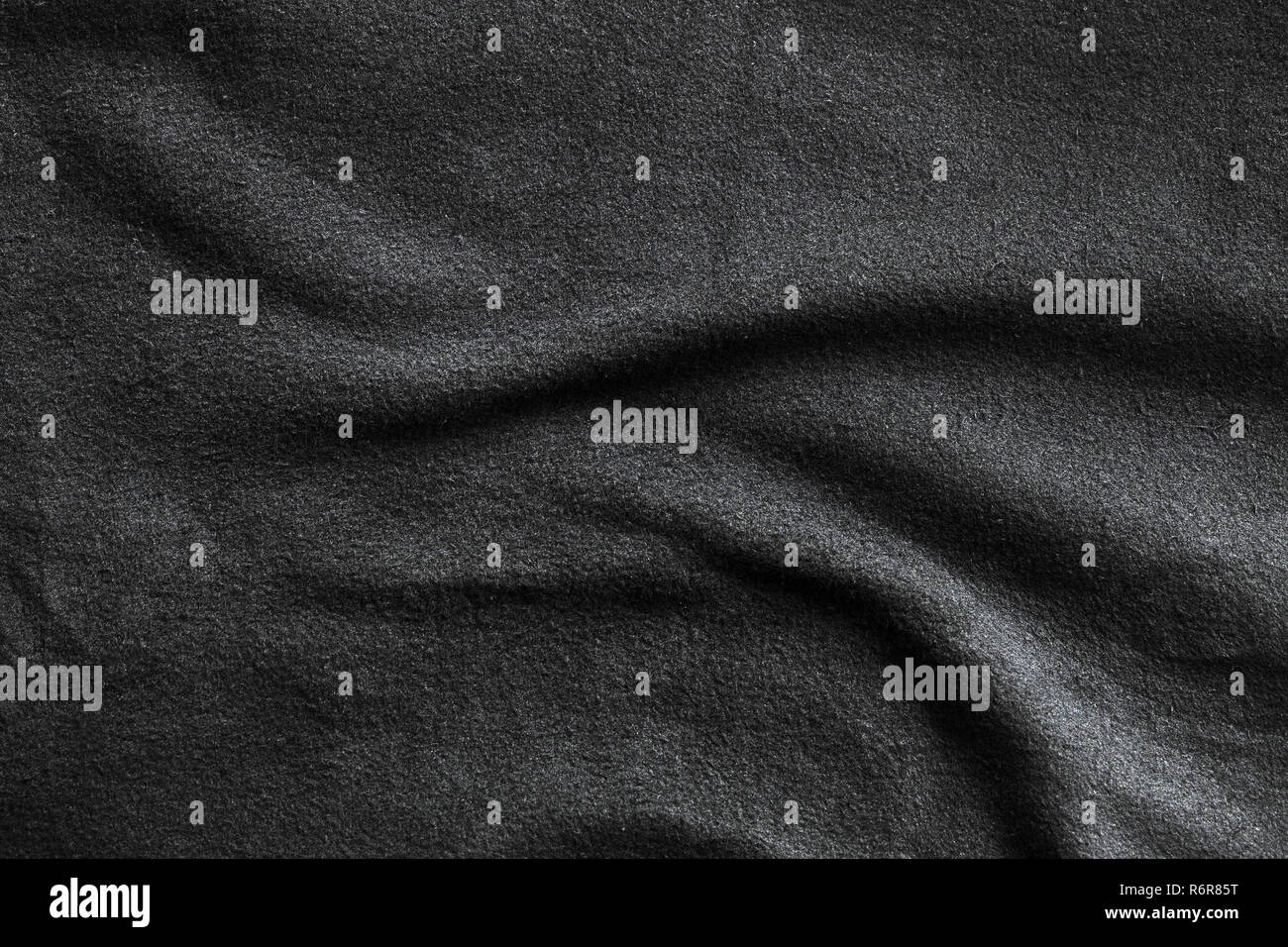 Texture of fleece, soft napped insulating fabric made from polyester, wavy pattern Stock Photo