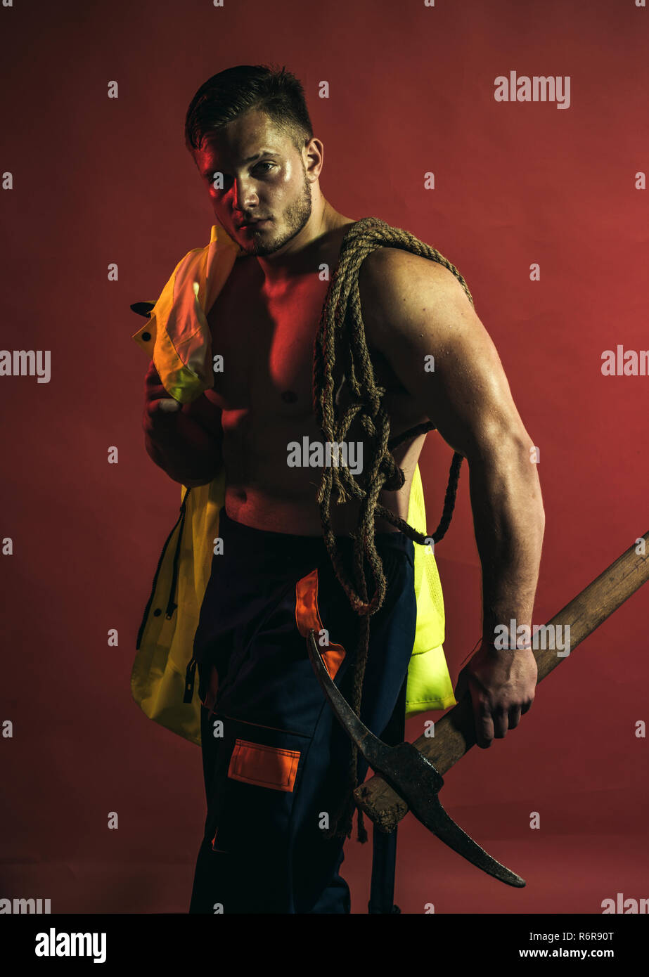 Project under construction. Muscular man worker. Construction worker or ...