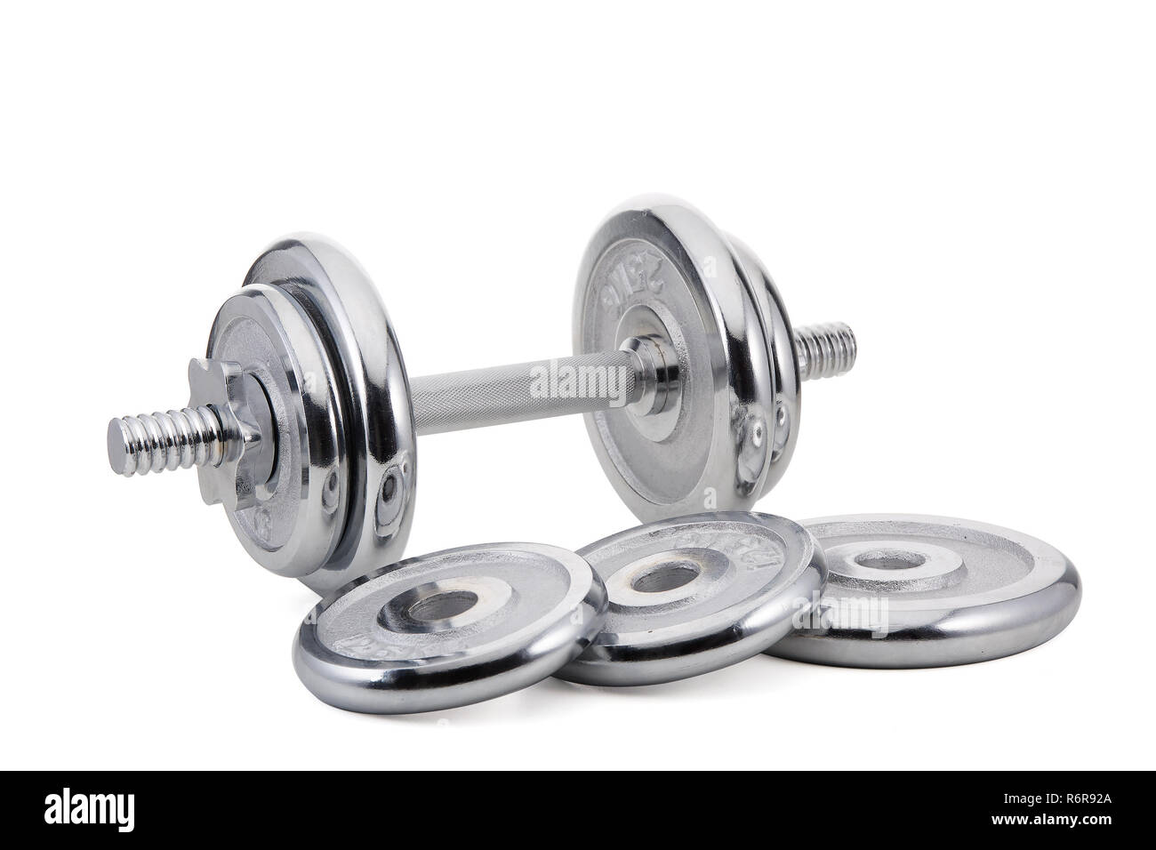 Steel dumbbell and weights Stock Photo Alamy