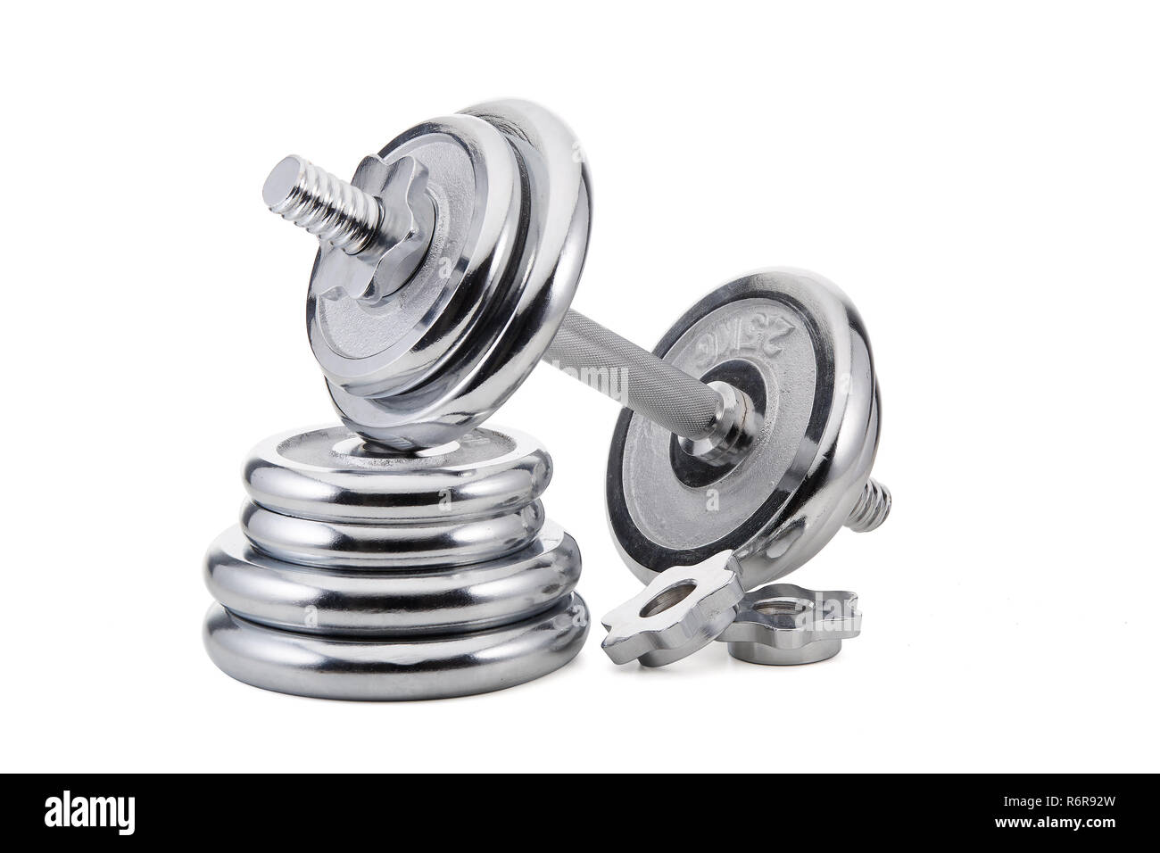 Steel dumbbell and weights Stock Photo Alamy