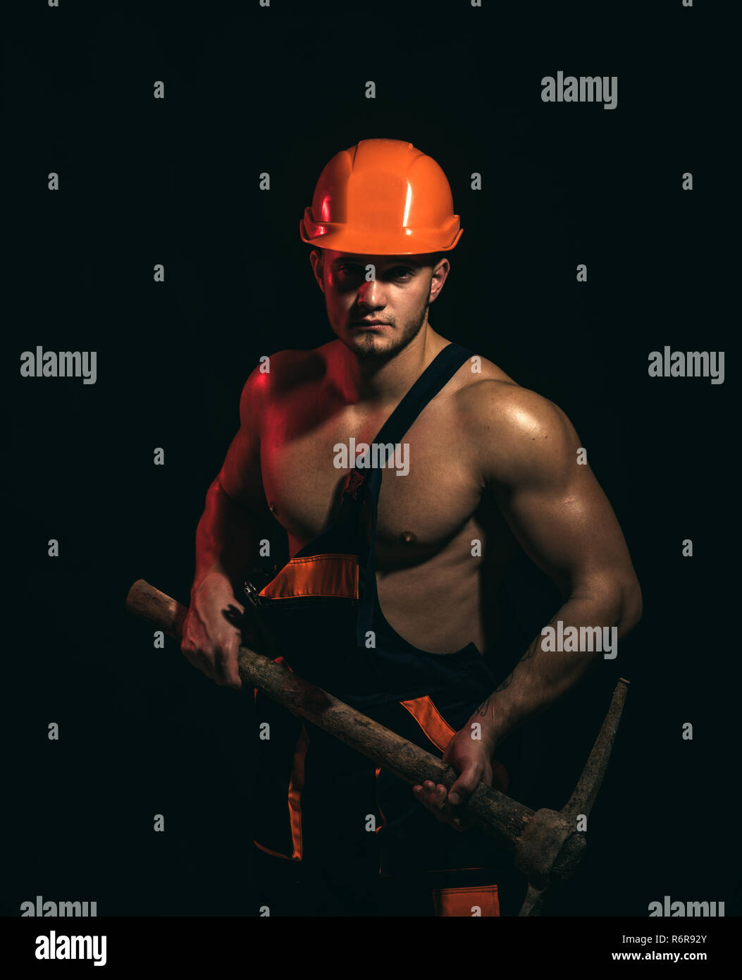 We renovating, under construction. Construction worker. Muscular man ...