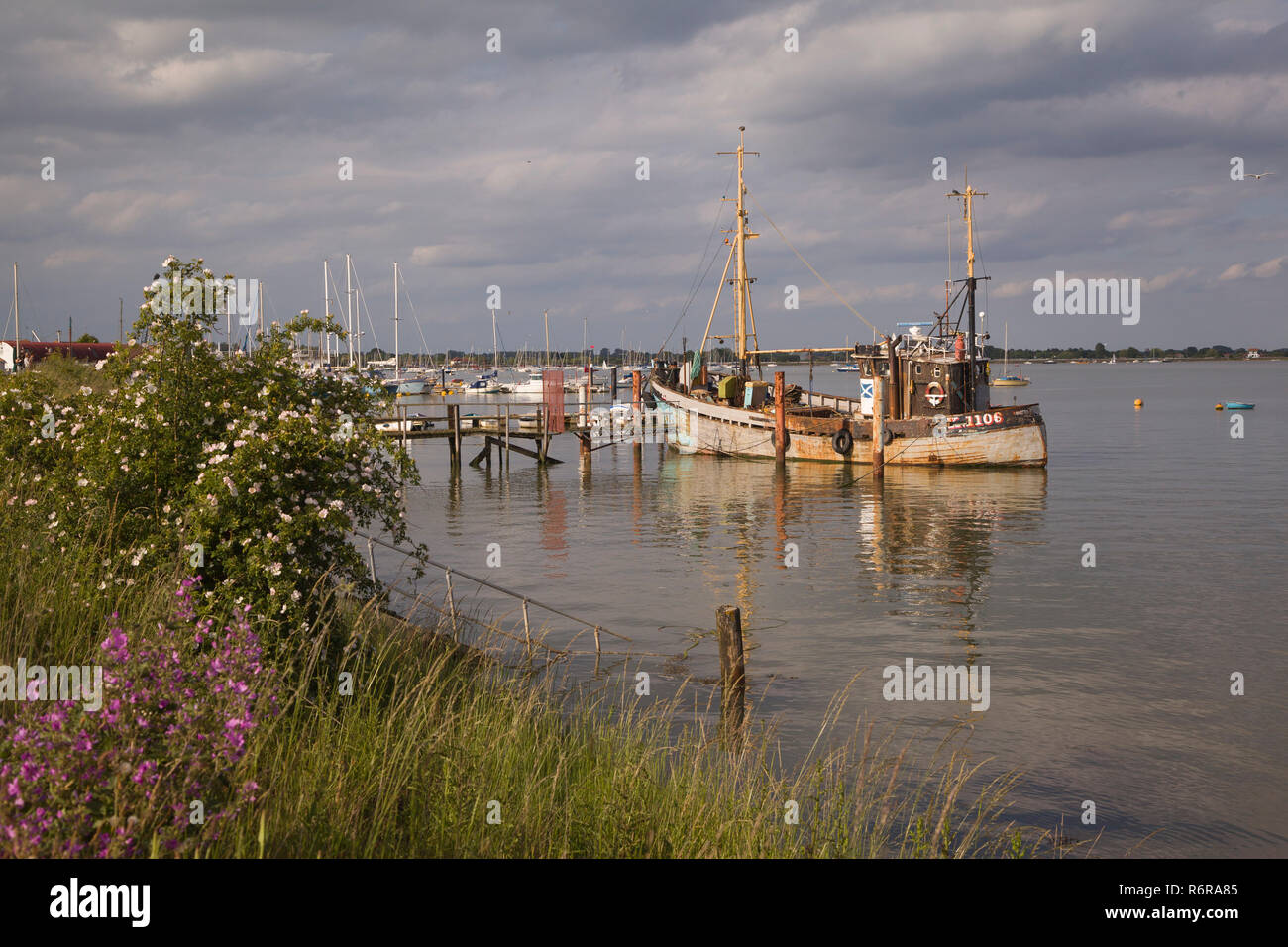 An old gently rusting fishing boat, the Ranger,  moored on the Blackwater Estuary at Maldon, Essex Stock Photo