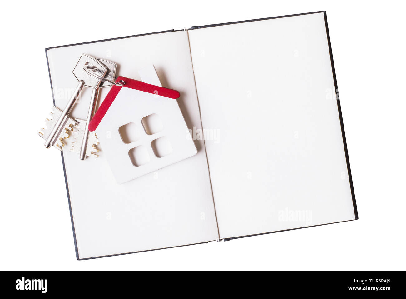 https://c8.alamy.com/comp/R6RAJ9/house-model-with-keys-over-open-blank-sketchbook-isolated-on-white-R6RAJ9.jpg