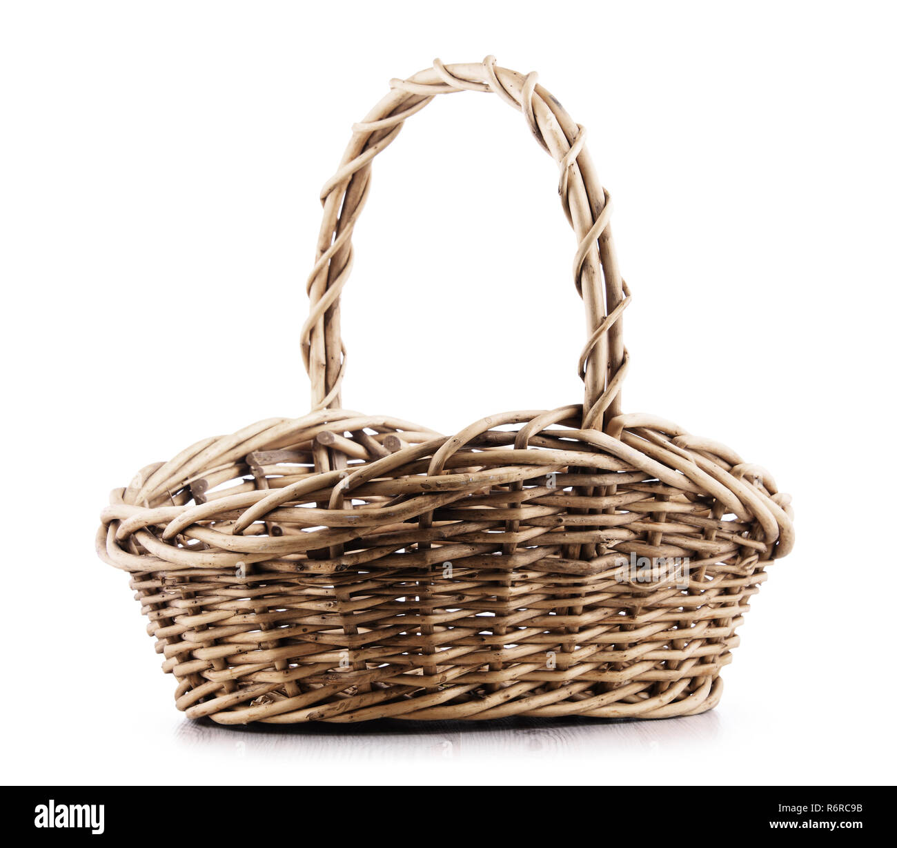 Empty wicker basket isolated on white Stock Photo Alamy