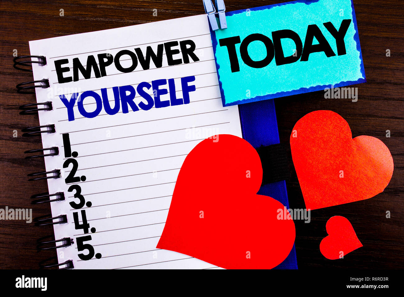 Announcement text showing Empower Yourself. Concept meaning Positive Motivation Advice For Personal Development written on notebook book paper on the wooden background Today Love Heart. Stock Photo