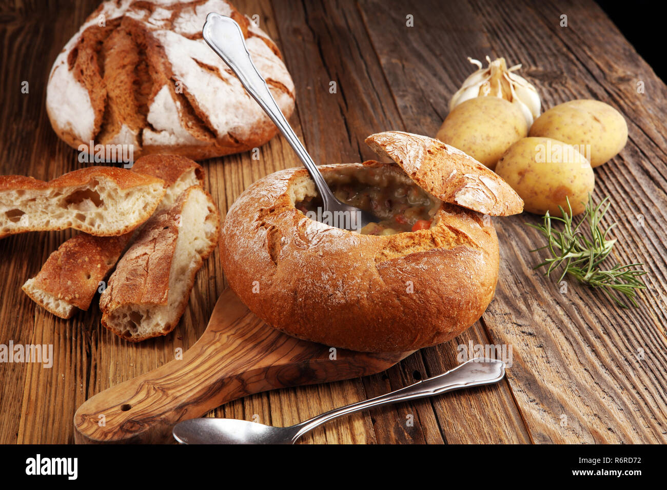 Homemade potato cream soup, served in bread bowl Stock Photo Alamy