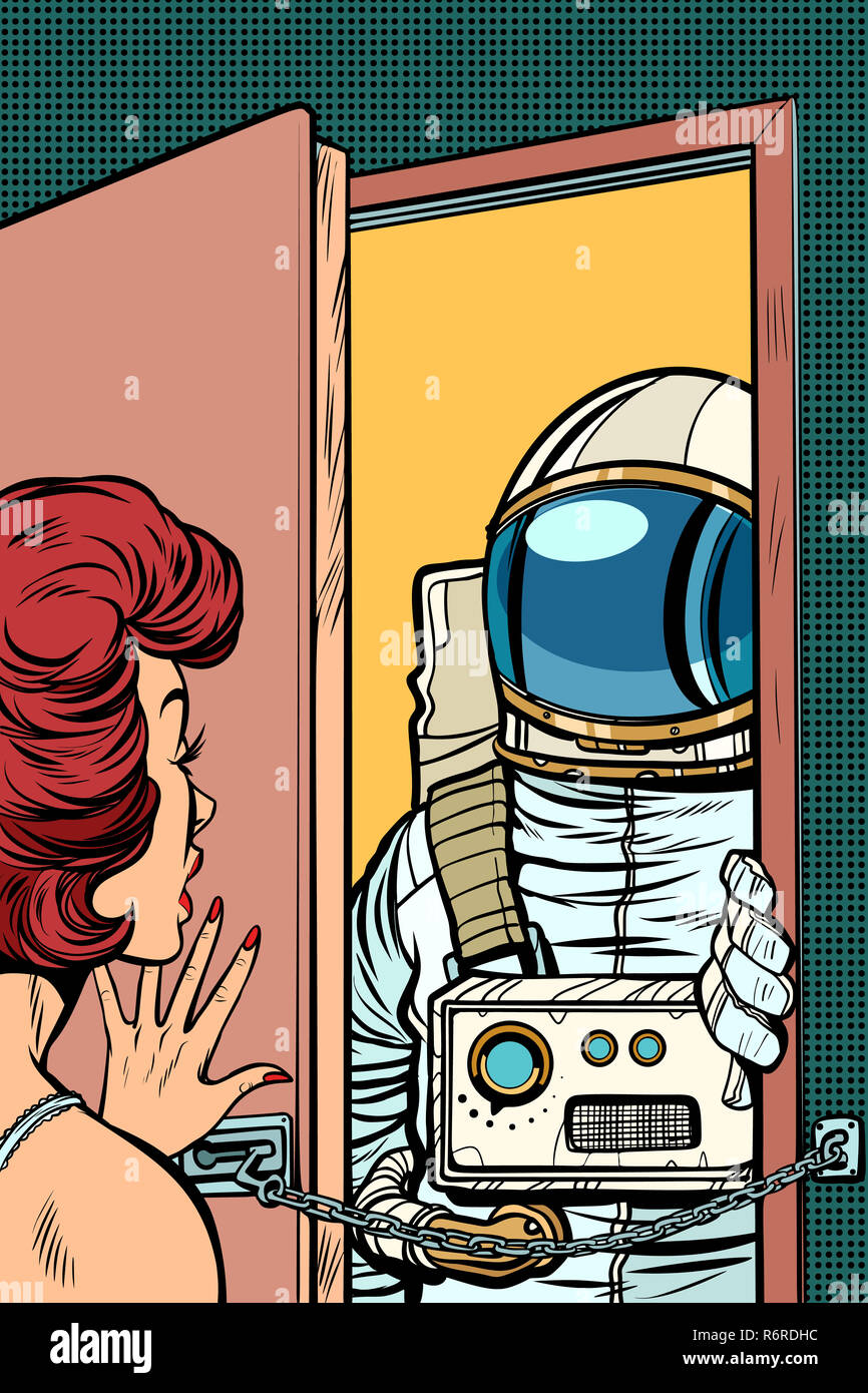 Astronaut came to visit a woman, the door was opened Stock Photo
